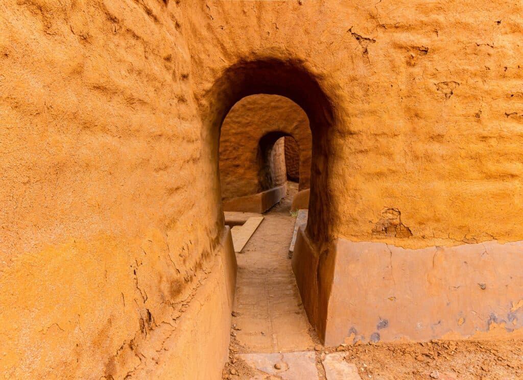 A passageway through the adobe walls at the Pecos National Historical Park in New Mexico.