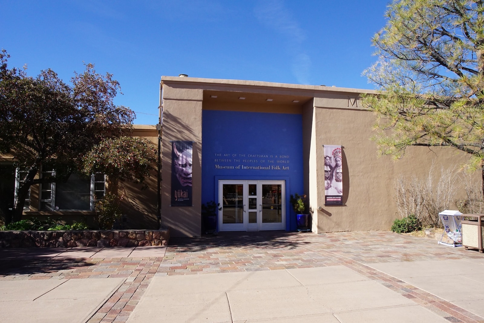 Entrance To The Museum Of International Folk Art, A Blue Entrance Among Desert Colors At Museum Hill Santa Fe.